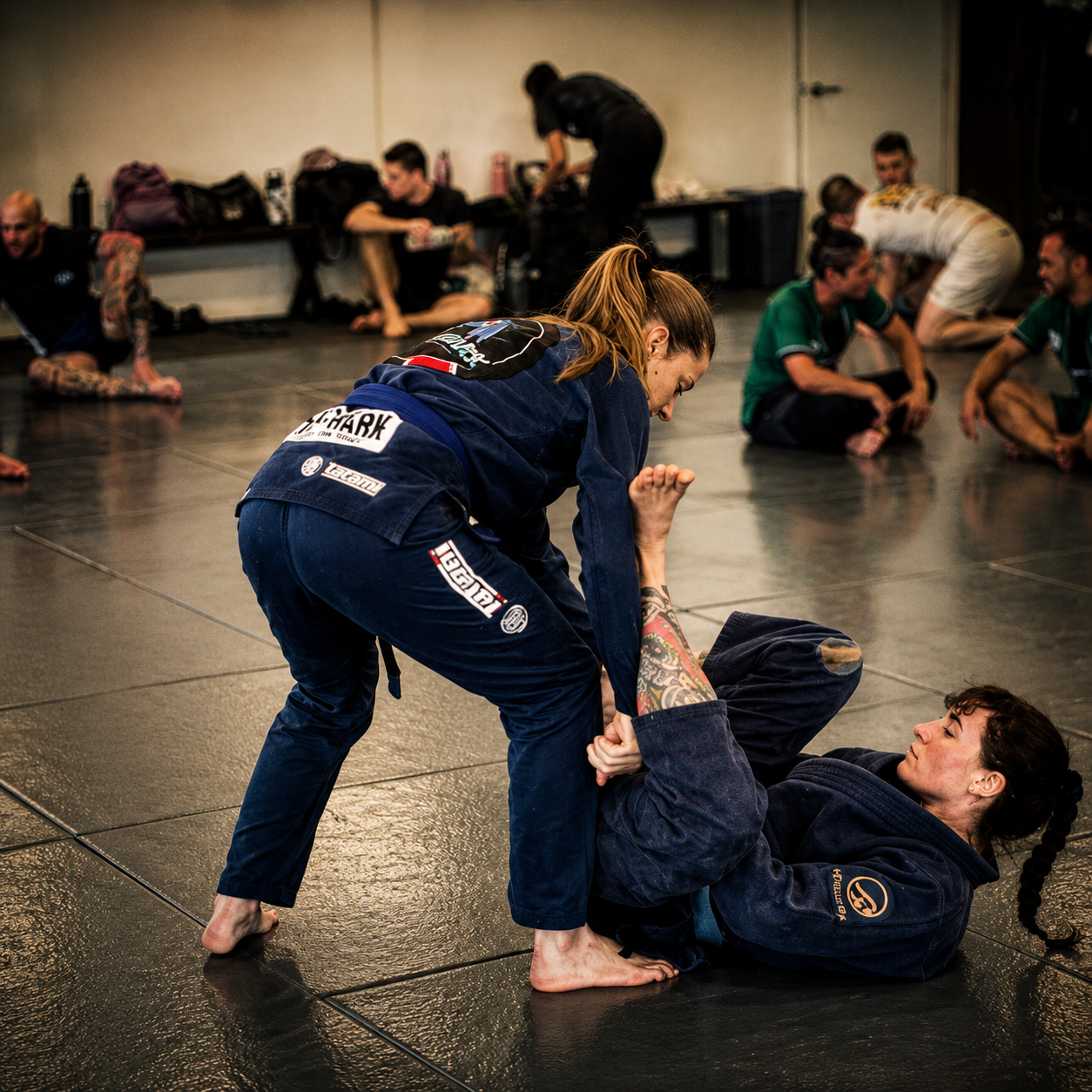 Two women drilling guard passing in the gi at Mat Shark