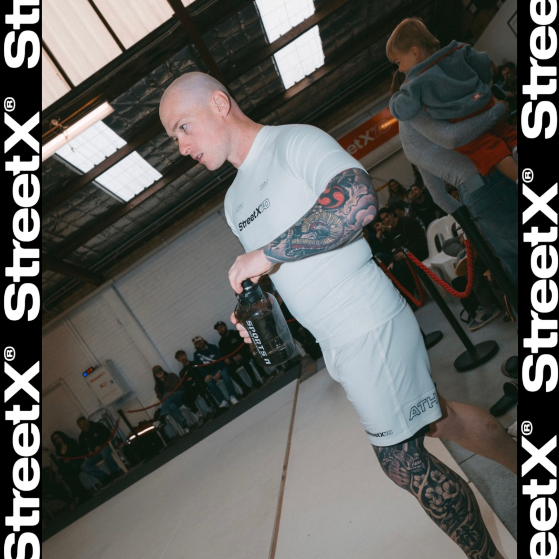 A Mat Shark athlete walking out before his superfight