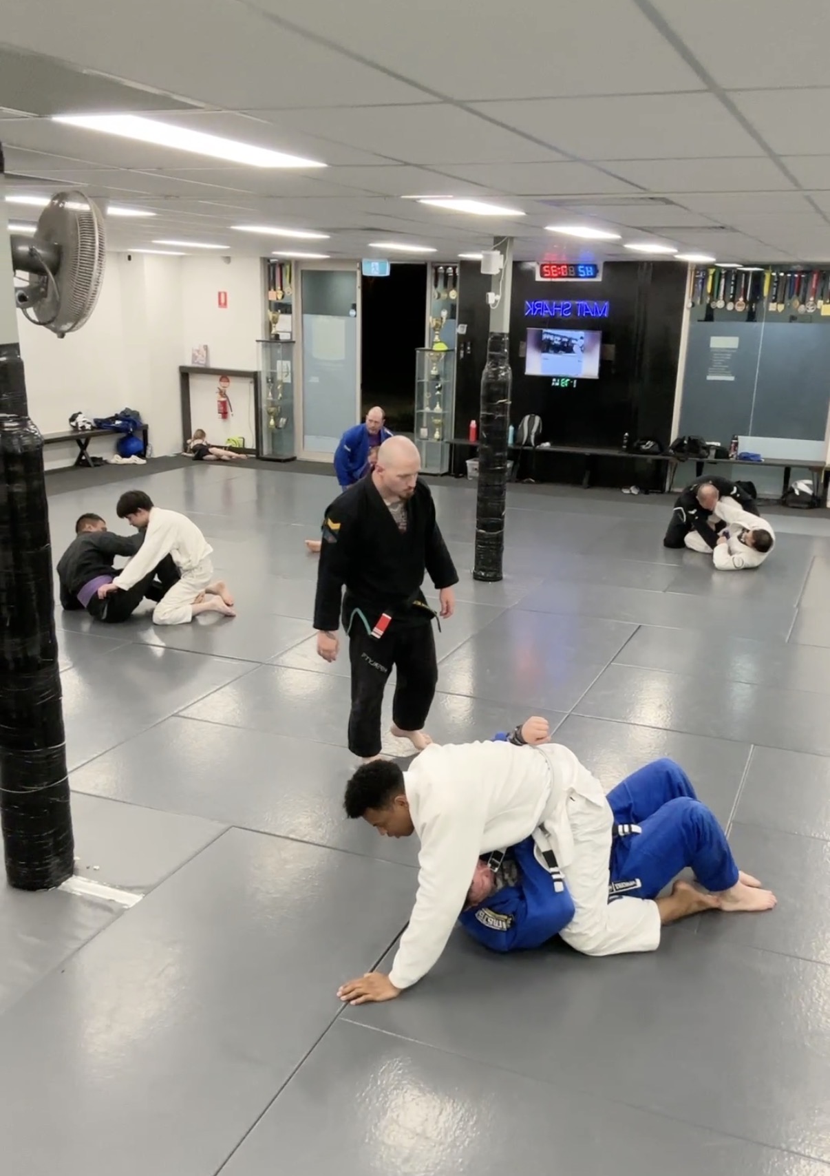 An open mat session on the floor at Mat Shark