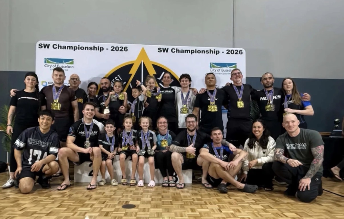 The Mat Shark team with their medals at the 2026 SW Championship